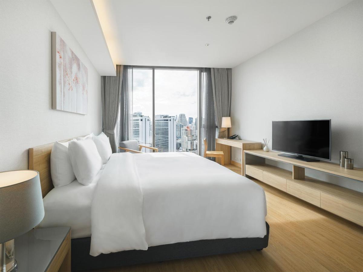 Oakwood Suites Bangkok Eksteriør billede Deluxe Room