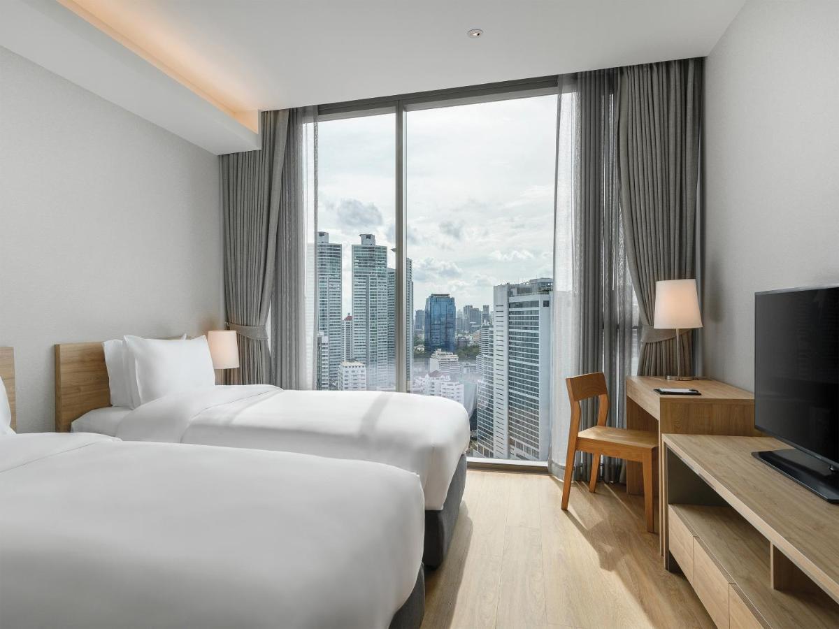Oakwood Suites Bangkok Eksteriør billede Deluxe Room