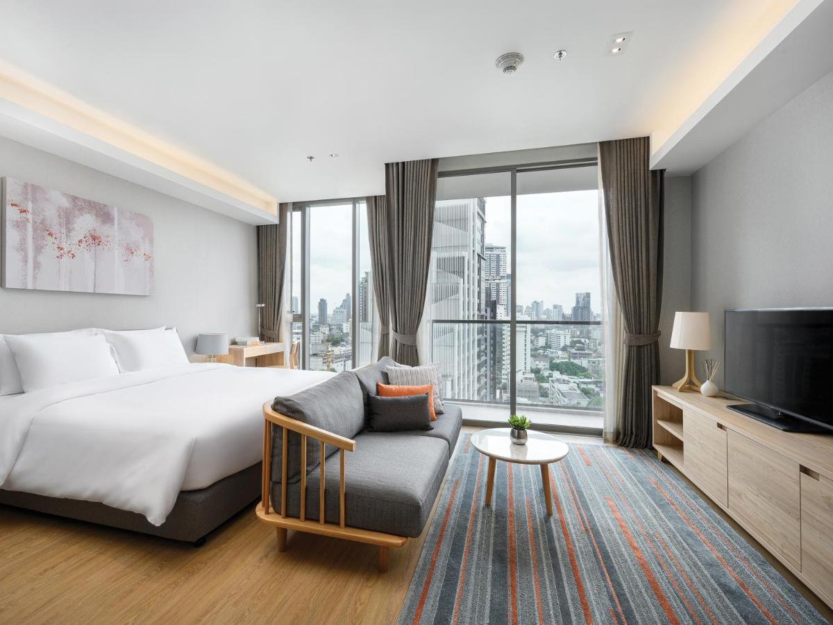 Oakwood Suites Bangkok Eksteriør billede Deluxe Room