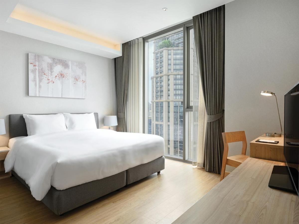 Oakwood Suites Bangkok Eksteriør billede Deluxe Room