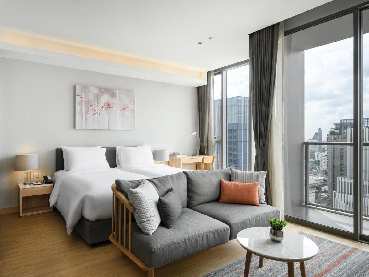Oakwood Suites Bangkok Eksteriør billede Deluxe Room