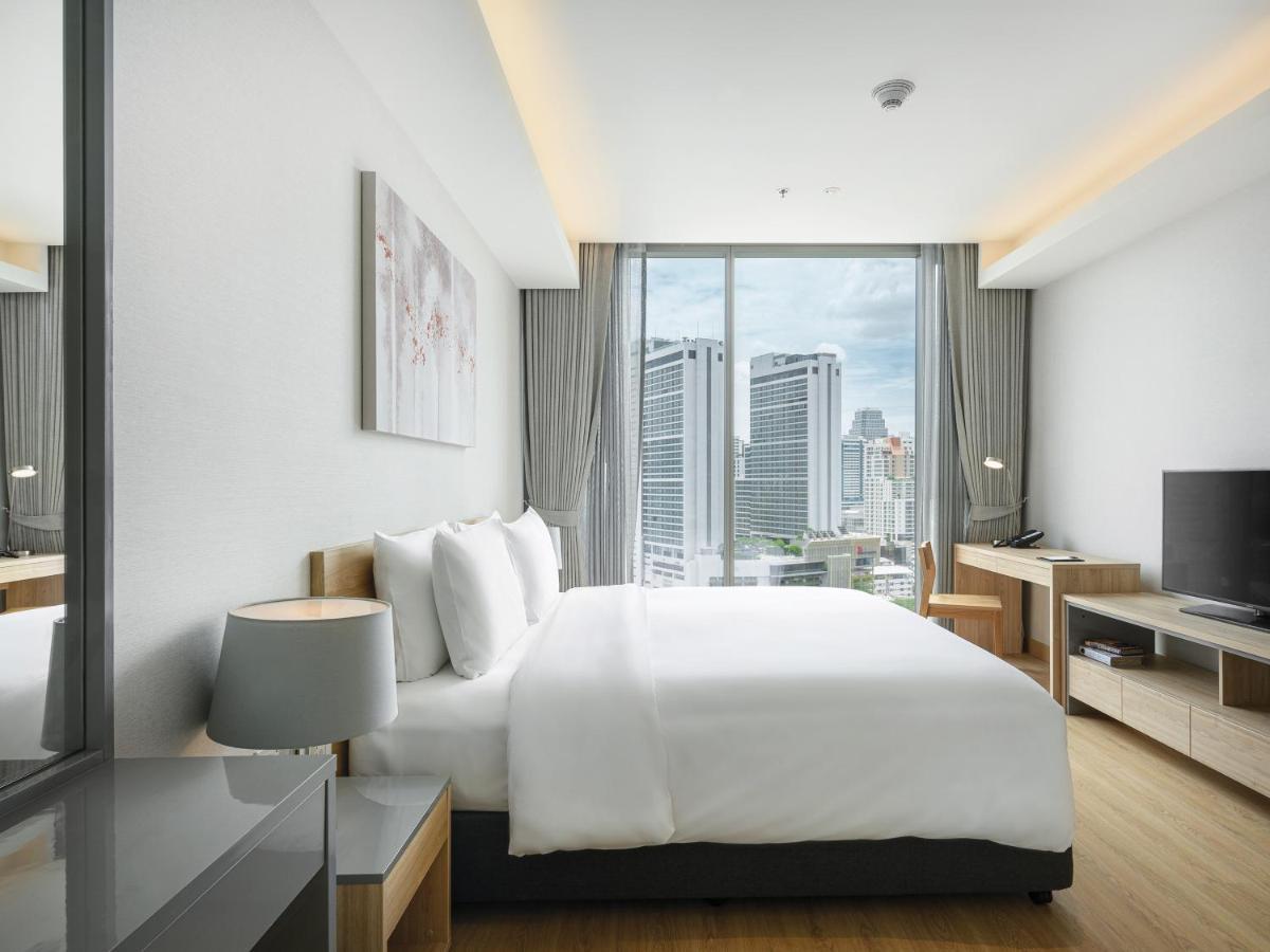 Oakwood Suites Bangkok Eksteriør billede Bedroom