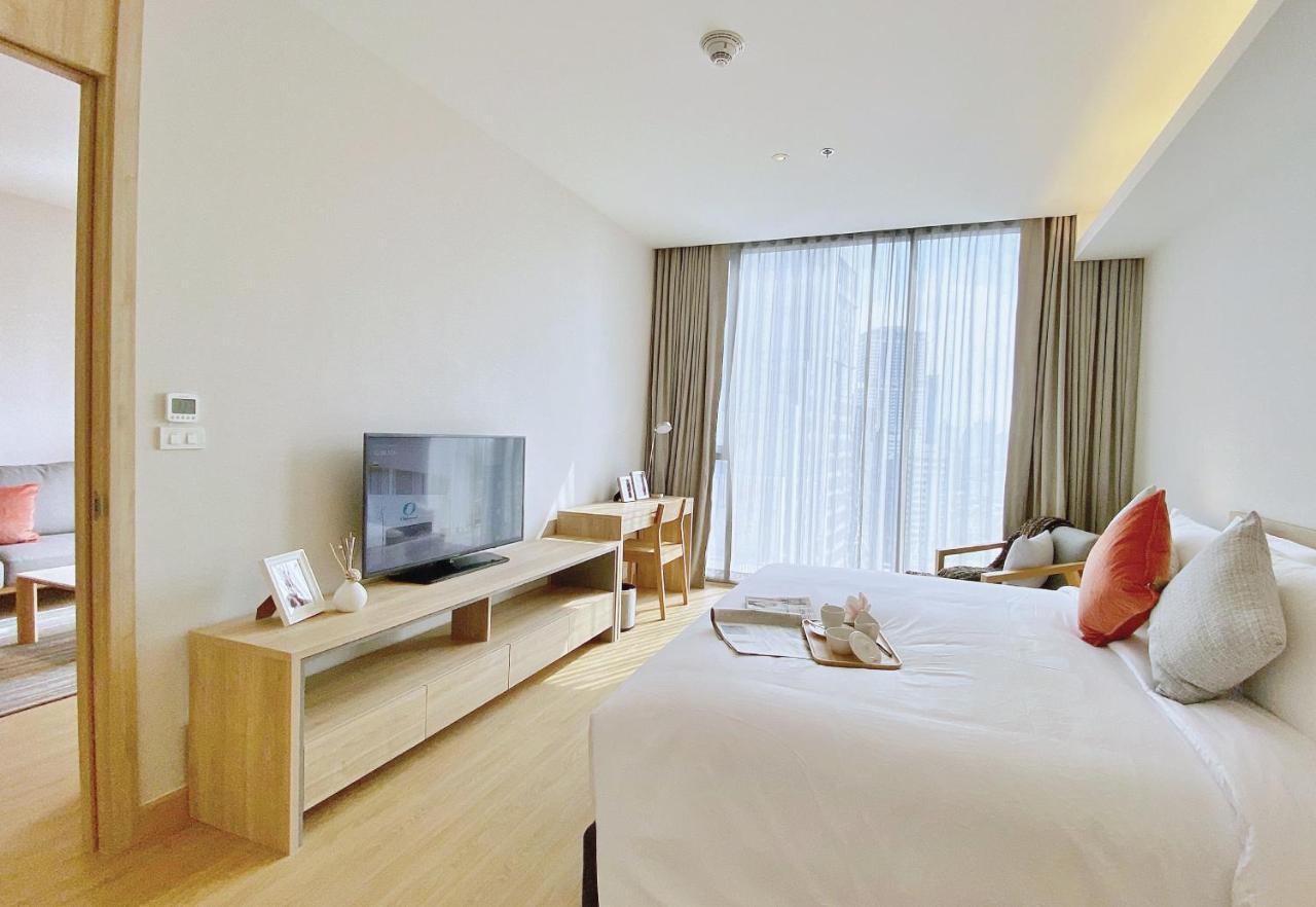 Oakwood Suites Bangkok Eksteriør billede Deluxe Room