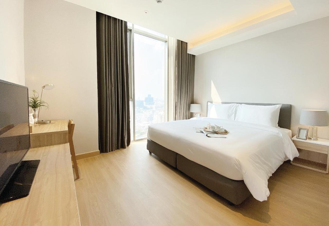 Oakwood Suites Bangkok Eksteriør billede Deluxe Room
