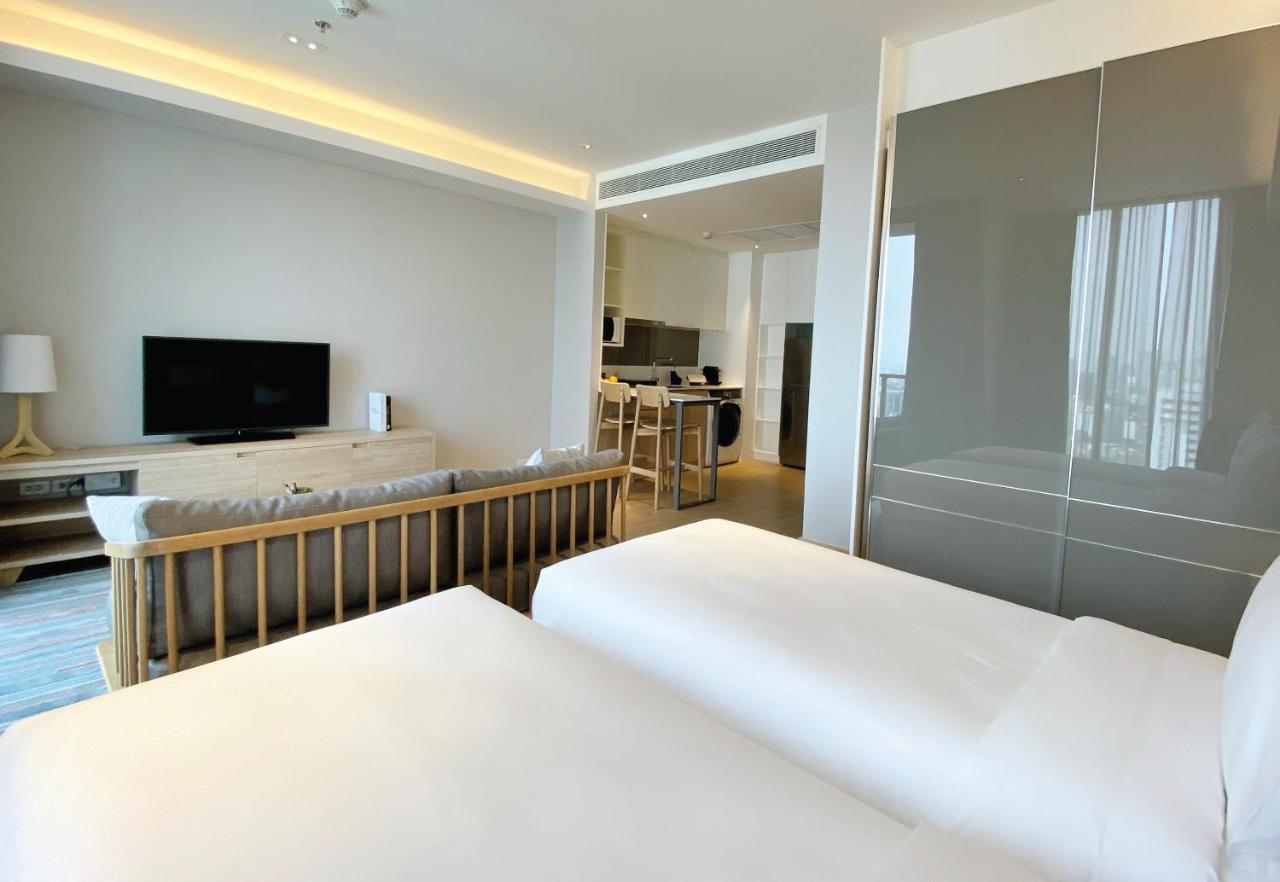 Oakwood Suites Bangkok Eksteriør billede A room at the hotel